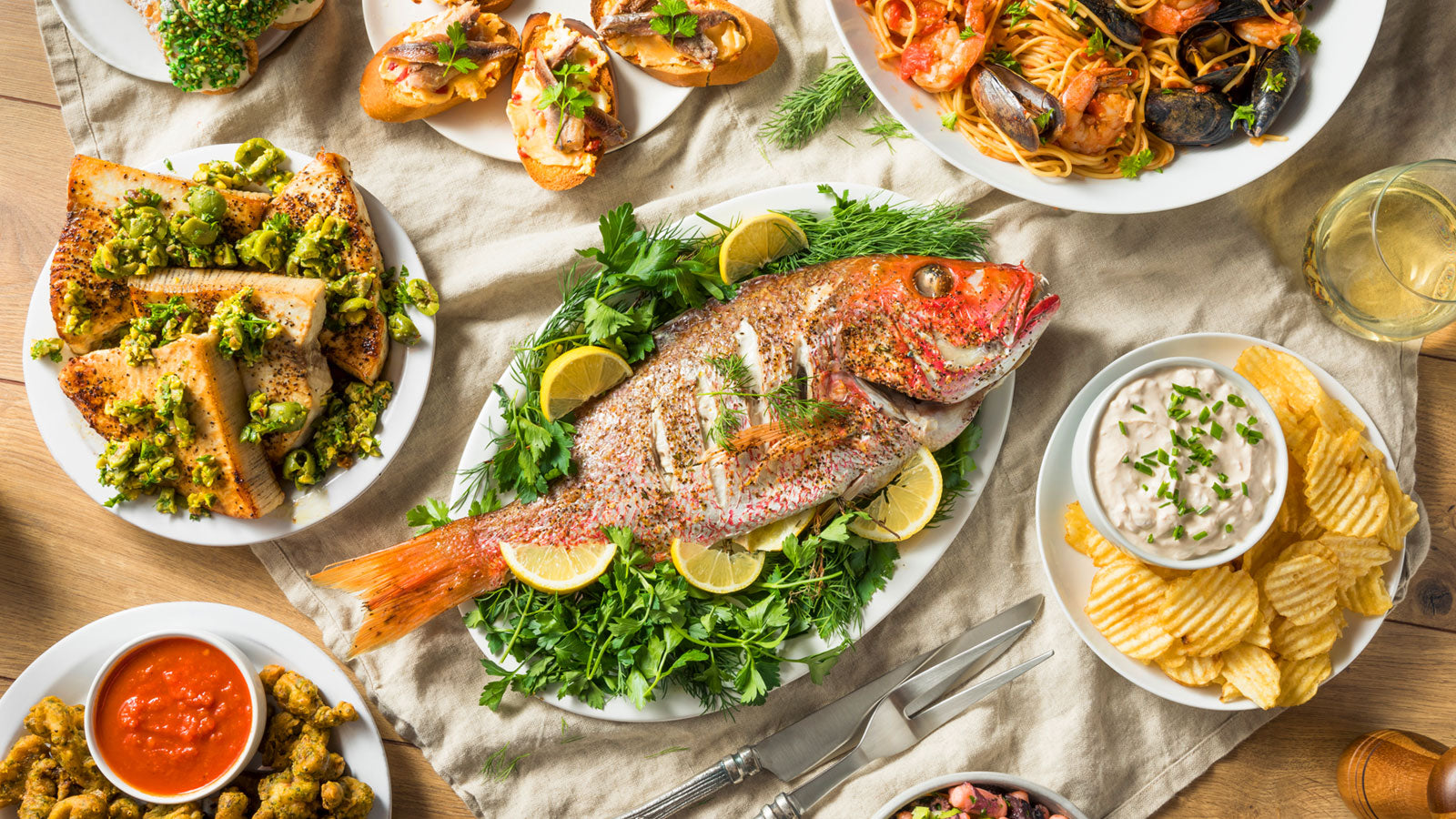 feast of the seven fishes dinner spread posted by get maine lobster